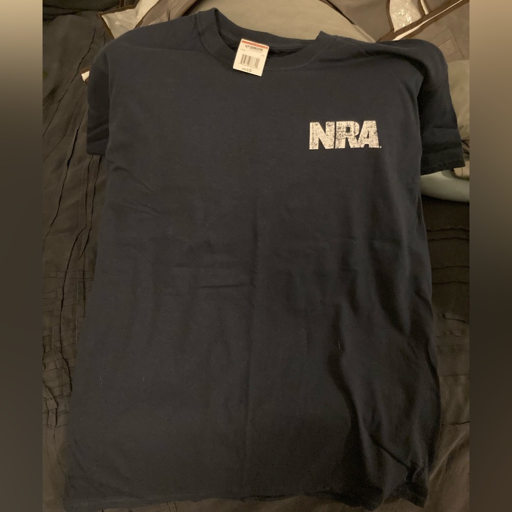 Dark Blue, Men’s size Large, NRA T-shirt. Never been worn. New with tags.